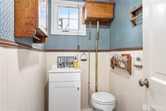 Main floor half-bathroom just off the kitchen.