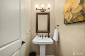 Stylish half bath for guests!
