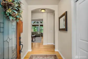 Soaring ceilings and huge windows fill the home with natural light and create  an open, airy feel