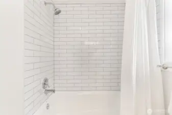 Upstairs bath with new shower tile