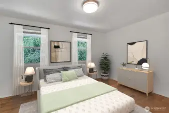 Generous primary bedroom has plenty of room for your bedroom furniture.