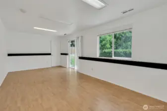 Extra finished room is full of natural light ready to host game day or use as a home office, fitness or playroom.