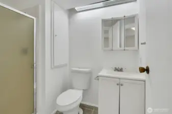 Convenient lower level three quarter bath.
