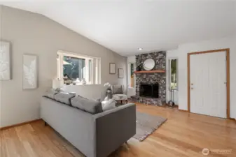 After you walk in, you turn to see the orignal brick fireplace that gives you that cozy feeling in the colder months.