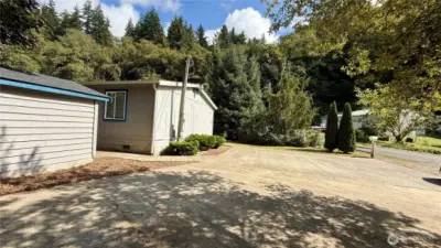 Extra Parking space, Shed and fenced back yard area
