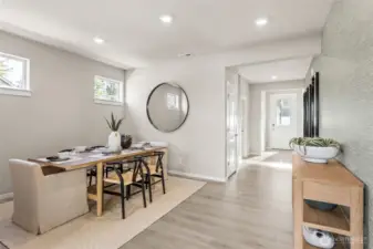 Large dining room for hosting dinner parties. Photo is representational. Actual home is under construction and colors, materials, and finishes may vary. See site agent for details.