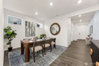 Formal dining space perfect for hosting. Actual home is under construction and colors, materials, and finishes may vary. See site agent for details.