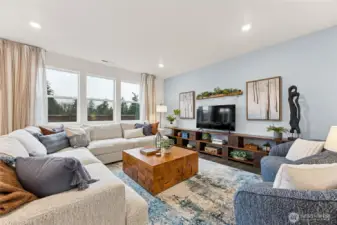 Gather everyone comfortably in the oversized great room area. Actual home is under construction and colors, materials, and finishes may vary. See site agent for details.