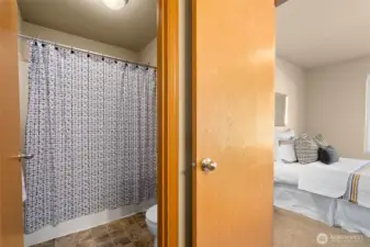 Dual sink bathroom connected to 2nd and 3rd bedroom