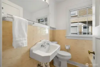 Main floor full bath spotlessly maintained with original character beautifully preserved.