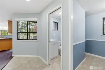 Half bath behind the kitchen and office (right by garage entry). Walk-in pantry on the far right.