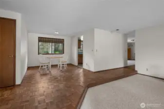 Enter in through front door into living room and dining room area.