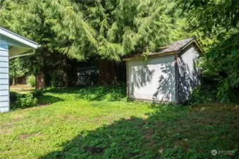 One of the two outbuildings for yard tool and storage