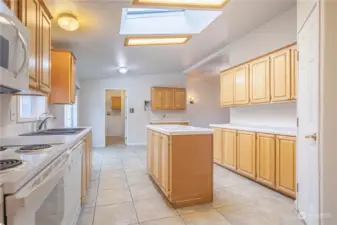 Large open kitchen with skylights