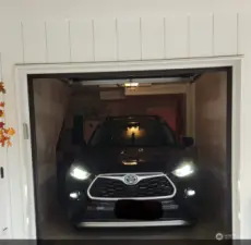 A view of a Toyota Highlander in the garage.