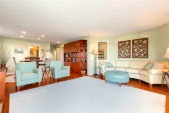 Den has open window to the living space and view.