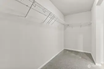 Primary WIC-Disclaimer- Photos are of Model home from previous community and are for illustrative purposes only. Finishes, flooring, features, and upgrades, may vary