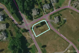 Lot five is outlined in this photo. The HOA has well-maintained homes, most lots are a half-acre or more, and this lot enjoys views of Mats Mats Bay and the Cascade  mountains.