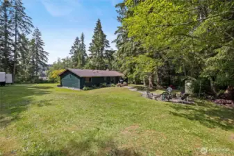 Large cleared yard is ready for your gardening goals!