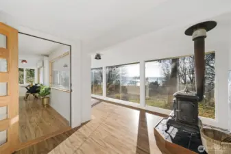 Looking southwest, natural light in abundance.  Living room through door.