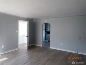 Front Living room to kitchen and front door
