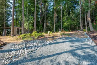 Road to drive around the acre+ of property.