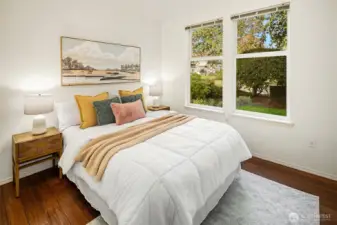 The second bedroom with its south facing windows offers lots of natural light for guests, an office, a craft room, or whatever you need.