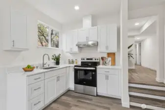 Fully renovated lower-level kitchen offering a separate and convenient cooking area, well suited for extended living arrangements or income potential.