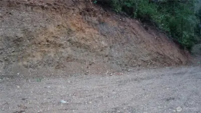 Nice clear driveway to the open area with the mountains view and hood canal.