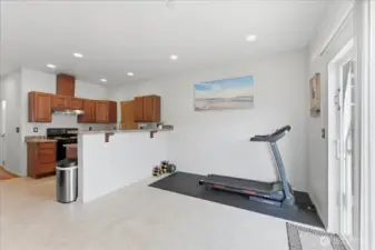 Counter space to sit at and room for table and chairs, or exercise equiptment. Your choice.