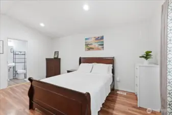 Primary bedroom and private bath.