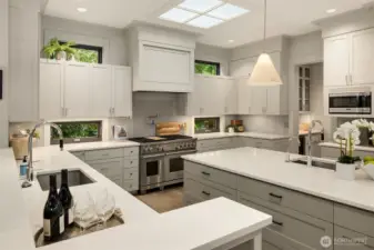 Epicureans will appreciate the grand kitchen, with well-placed windows and a skylight for maximum natural lighting.