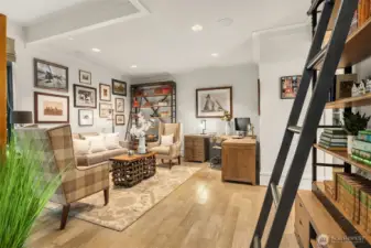 Double doors open to the main floor bedroom suite, perfect for guests, an office, or multi-generational living.