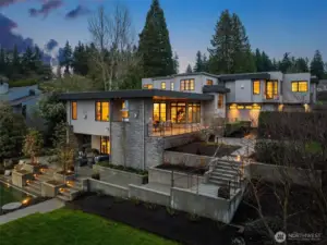 Thoughtfully designed outdoor areas utilize the space and privacy with a blend of hardscapes and curated landscaping.