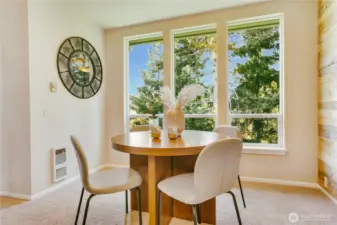 Walls of windows bathe in natural light in your dining area, the perfect project space to be inspired.