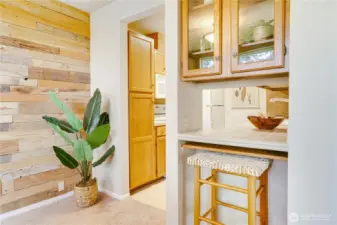 From the dining area into the kitchen - glass cabinets and a pass through to open up the versatility of the kitchen.