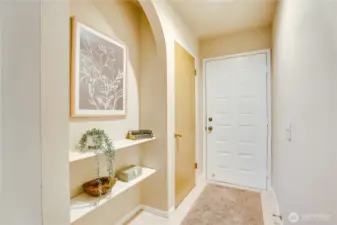 Cute entry with a place for your keys, shoes and inspirational items.