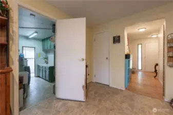 Door to utility room and entrance hallway