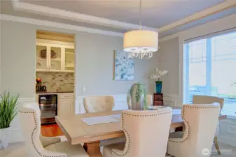 Formal dining room connects to butlers pantry for easy entertaining.