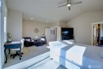 Primary bedroom also has sitting area.