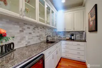 Butlers pantry with wine/beverage cooler.