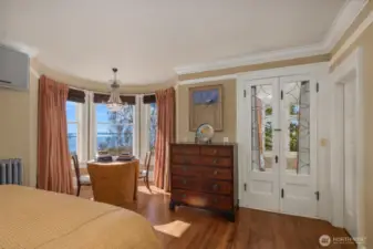 Primary suite faces the city and sound views and has adjacent large view office and ensuite full bath and dressing area.