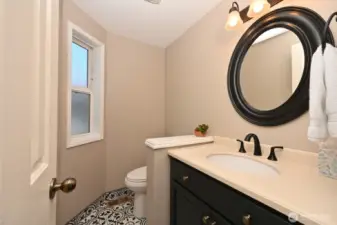 Updated half bath on the main level.