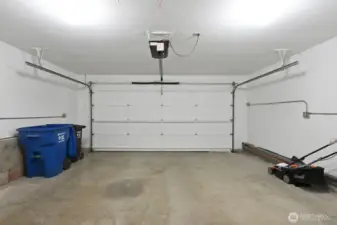 Spacious garage and the mower stays!