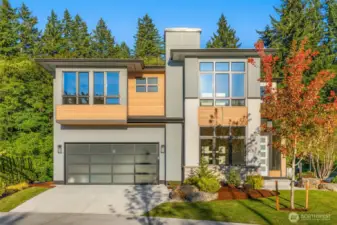 Extensive use of clear cedar siding and stone accents create a timeless NW Contemporary design