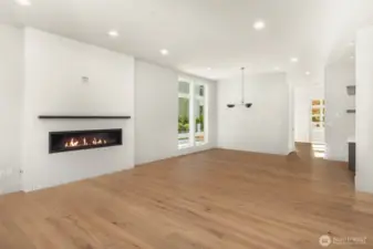 60" contemporary linear fireplace with full height tile surround and custom steel mantel