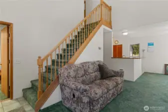 Vaulted Living Room to second story with 2 more bedrooms and another bathroom