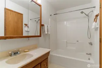 Main Level Bathroom has Continental Access Primary Bedroom and Hall