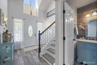 Beautiful natural light pours in from this airy foyer.