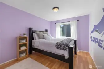 Bedroom #2 offers a large space with double sided closet.